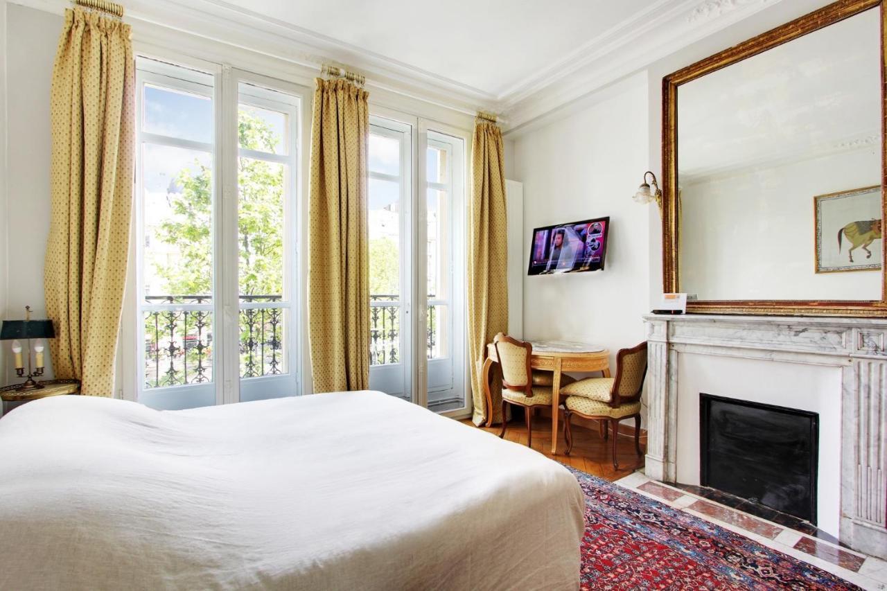 Suite Junior Avec Balcon Et Vue Sur Arc De Triomphe Paris Exterior photo